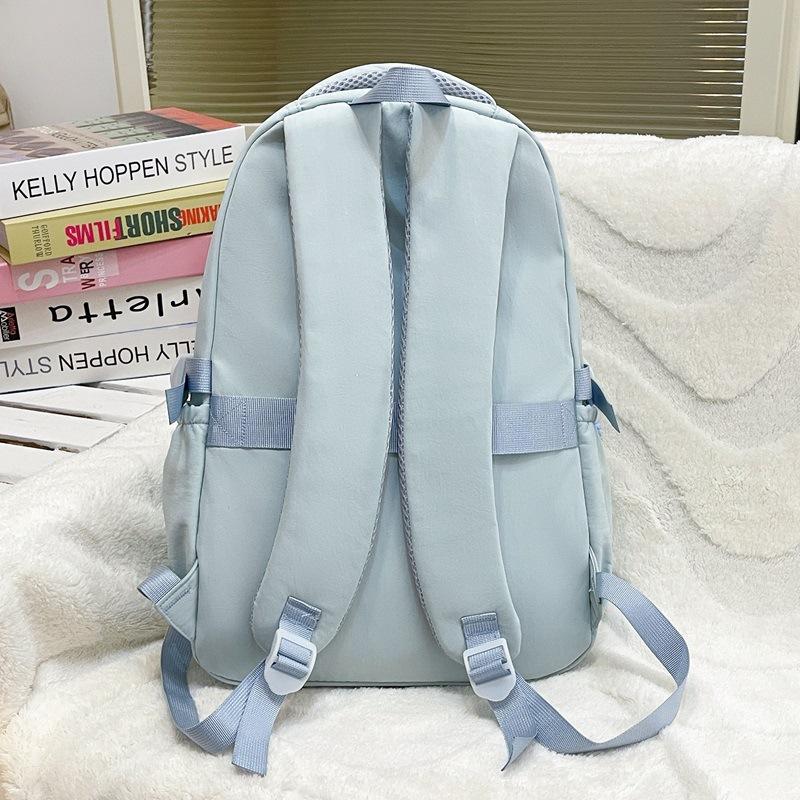 Schoolbag Elementary school bag Female junior high school student Large capacity simple campus backpack College student travel leisure backpack