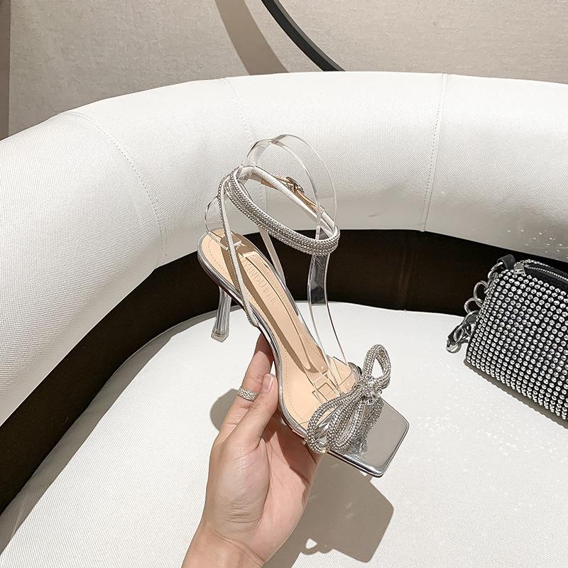 

-Mu Yindu spring and summer high-end sense open-toed rhinestone bow square head with silver high-heeled sandals 40