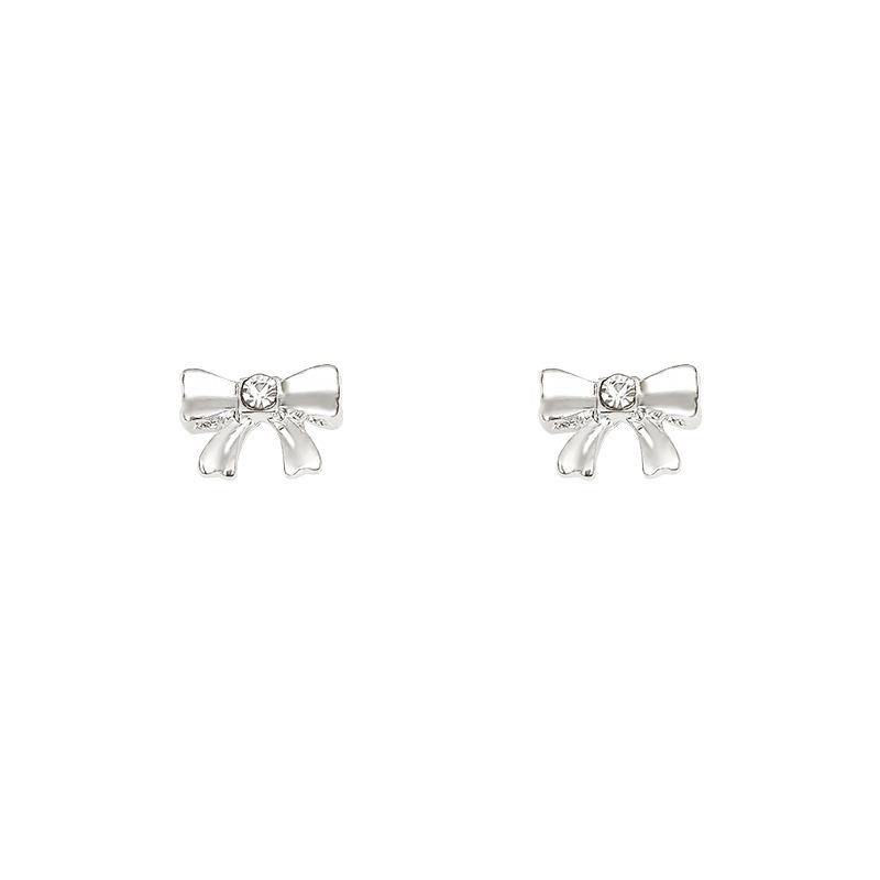 Korean version of small silver bow stud earrings femininity simple personality Internet celebrity earrings sleep free earrings