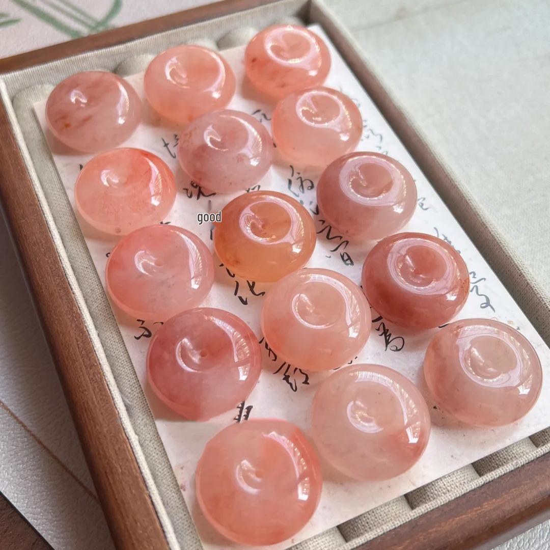 

Natural Xinjiang Golden Silk Jade Pi Xiu Pendant with Pink Pi Xiu and Peach Blossom Design.