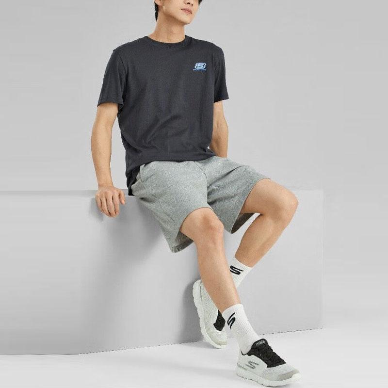 Skechers Solid Color Round Neck Loose Short Sleeve Drop Shoulder T-Shirt Unisex Tops Carbon-Black L223U092-0018
