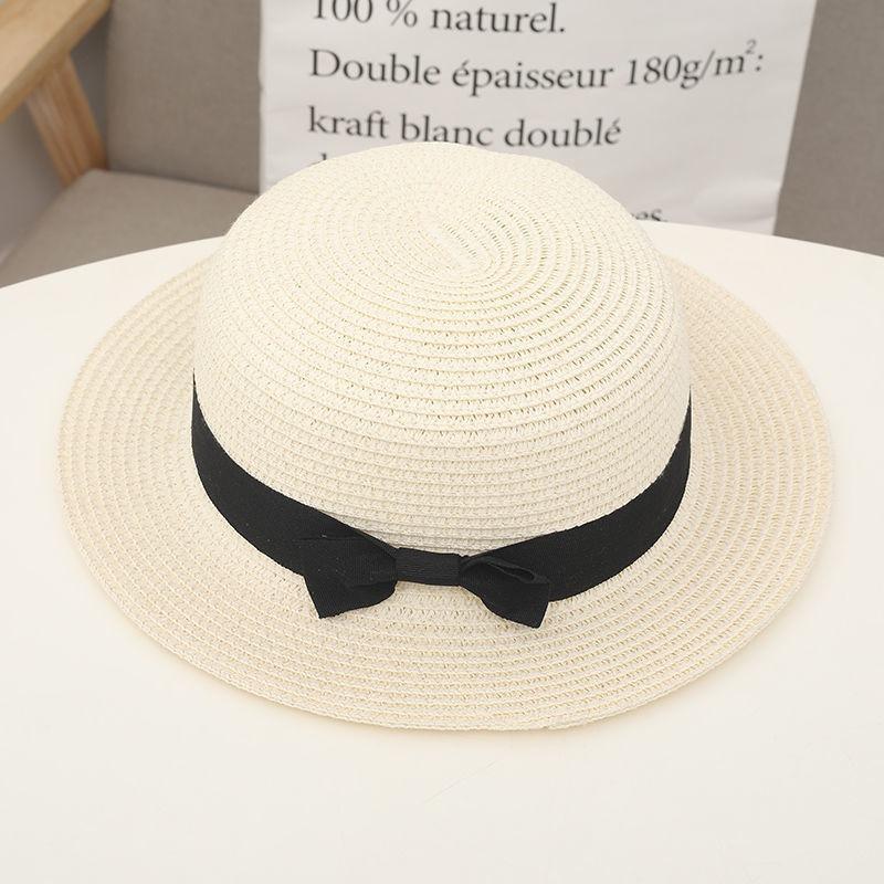 Flat top straw hat women's beach sunscreen bow top hat photo vacation straw weaving simple temperament sun hat