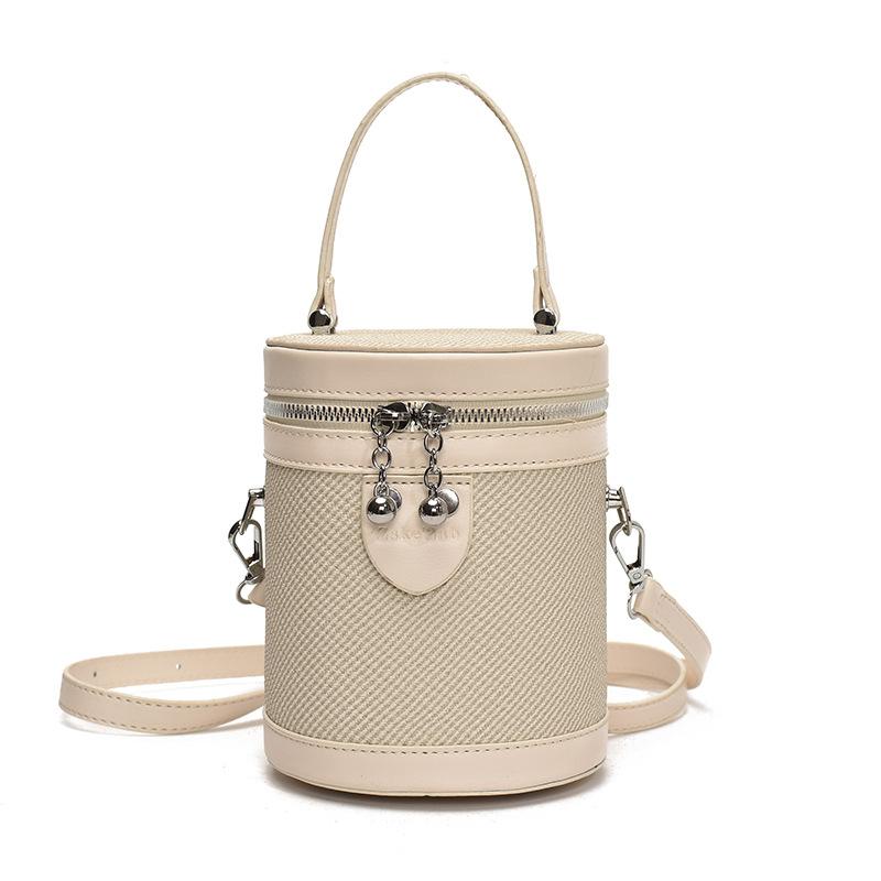 Niche design fashionable contrasting color portable canvas bag women's spring new versatile messenger bucket bag