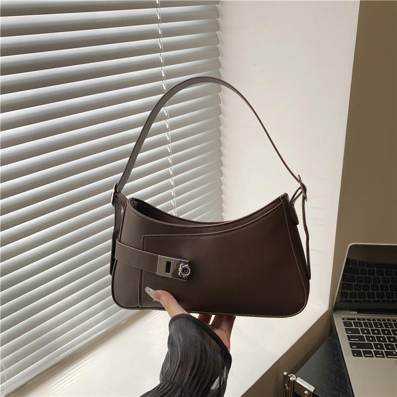 

Сумка женская летняя новая высококлассная однотонная универсальная подмышечная нишевого дизайна текстурная на плечо портативная женская сумка