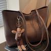 Hochwertige Retro-Tasche mit großem Fassungsvermögen, modische Damen-Umhängetasche für Pendler, beliebte Tragetasche