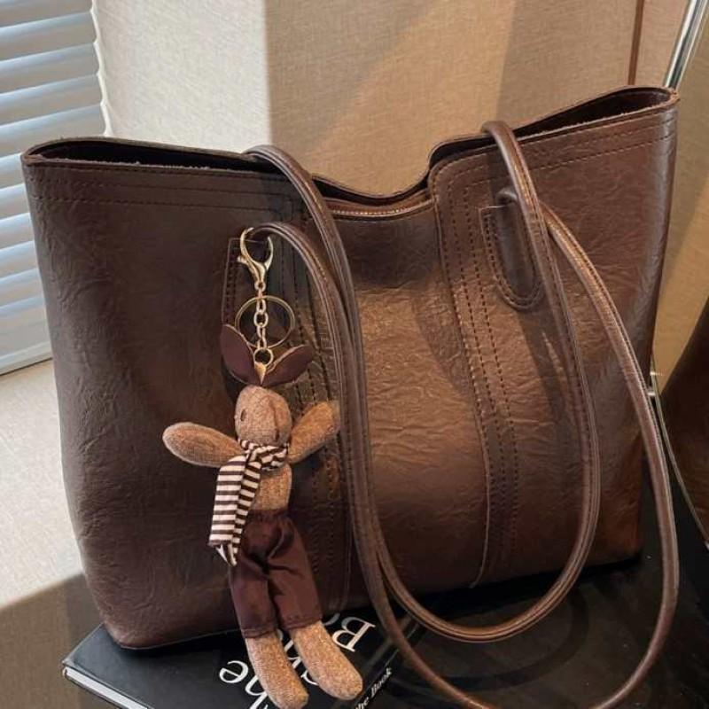 Hochwertige Retro-Tasche mit großem Fassungsvermögen, modische Damen-Umhängetasche für Pendler, beliebte Tragetasche