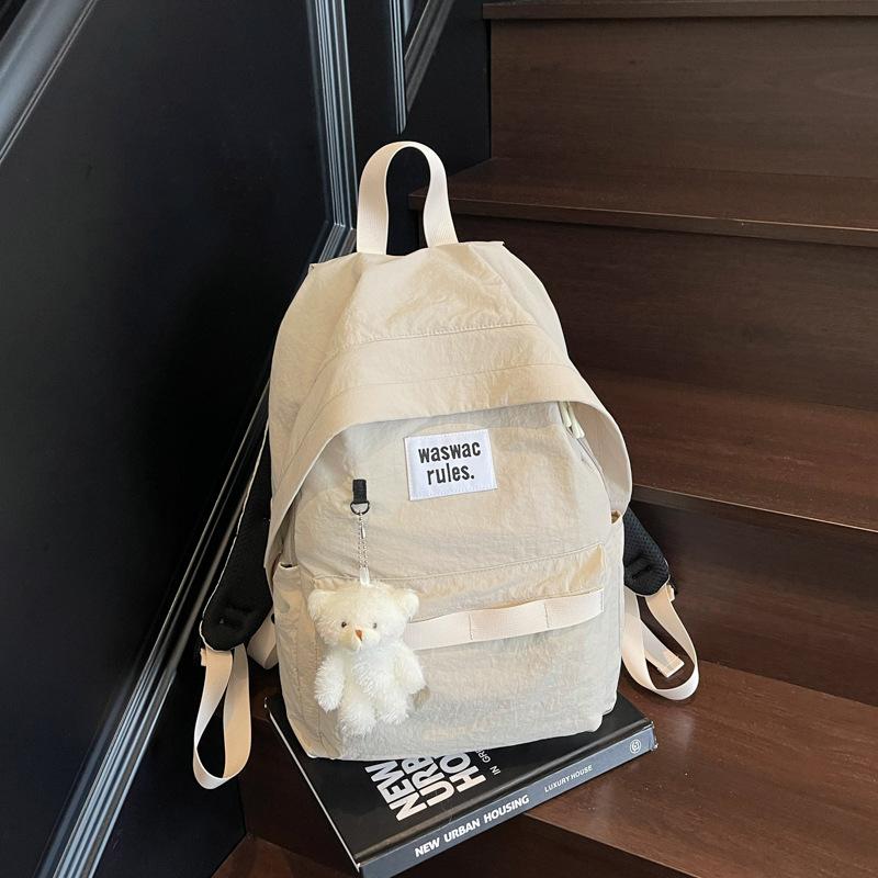 Niche ins style schoolbag female college student Japanese casual large-capacity backpack junior high school student simple design backpack