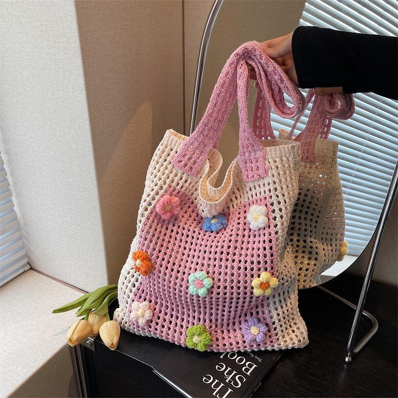 

Slack large-capacity knitted bag women s new commuter shoulder bag lazy wind hollow tote bag розовый