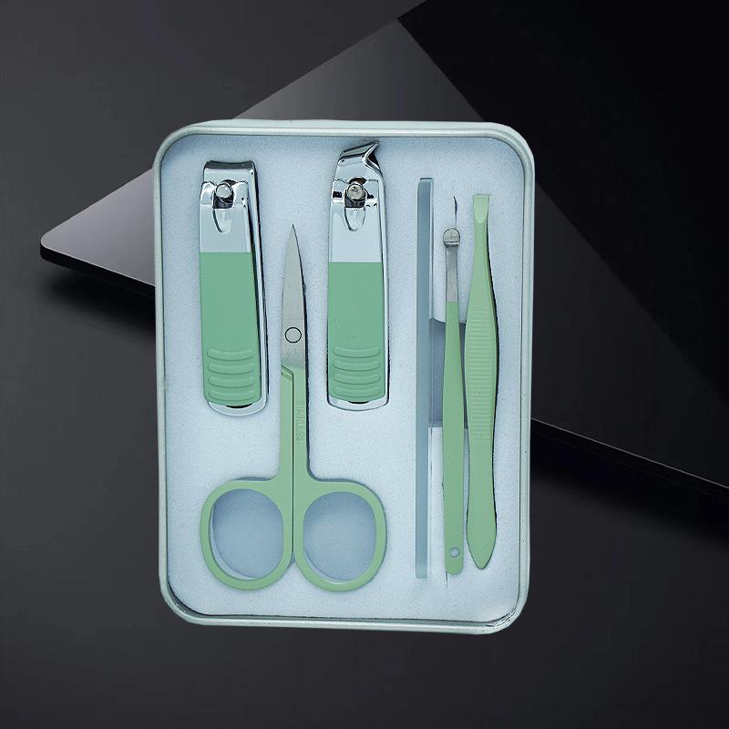 Nail Care Gift Set: Portable Tin Box with Clippers, Scissors, Tweezers, and Ear Spoon