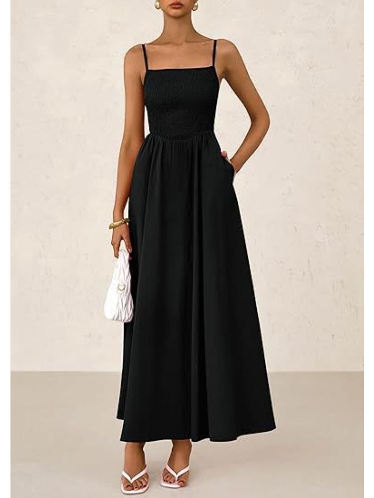 

Женское длинное платье на тонких бретельках с оборками и карманами S чёрный