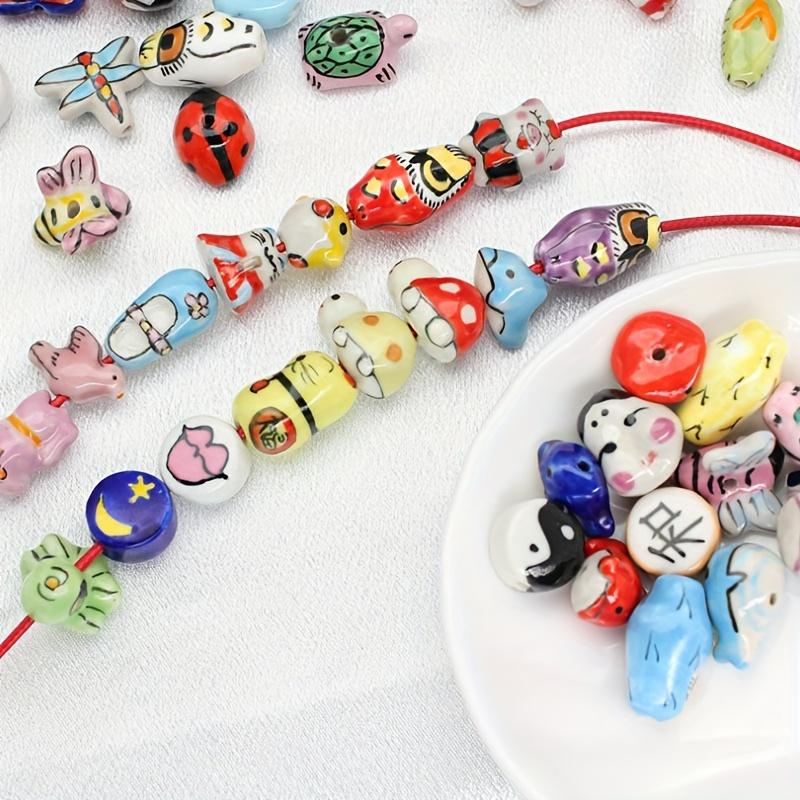 

Смешанные нарисованные от руки мультяшные цветные керамические бусины DIY аксессуары для браслетов перфорированные бусины россыпью 10pcs разноцветный
