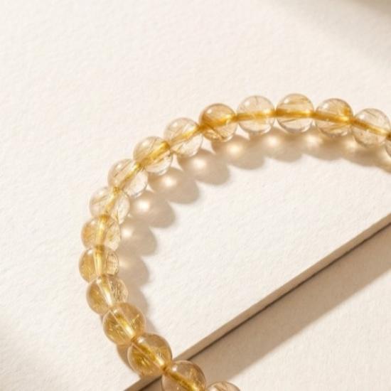 Chaîne de téléphone naturelle en cristal doré pour femmes, style bracelet, cordon de téléphone exquis haut de gamme, mode de niche, vintage et artistique