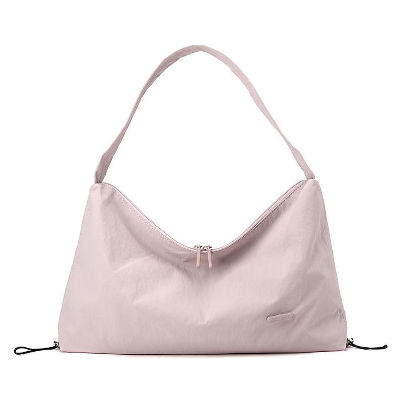Korean style spring and summer new women's solid color high-end niche shoulder crossbody armpit bag