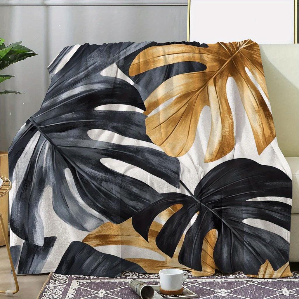 1 Stück Sdoo Flanelldecke - Retro Tropischer Monstera-Blätterdruck in Schwarz Weiß Goldgrau, Ultra-Weiche Ganzjahres-Kuscheldecke für das Sofa