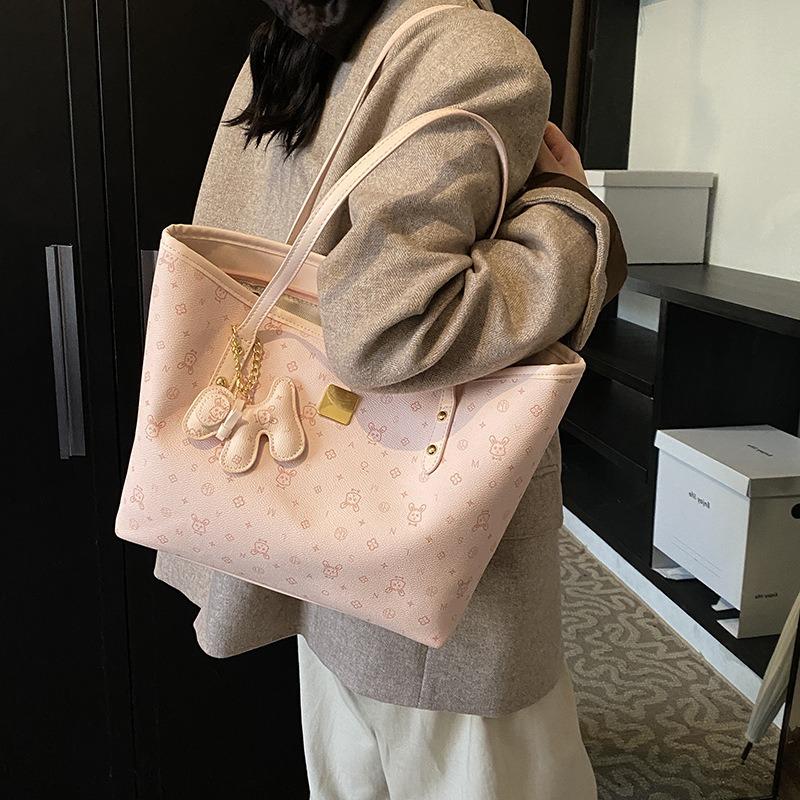 Niche casual shoulder bag women's new high-end sense large capacity simple fashion commuter tote bag