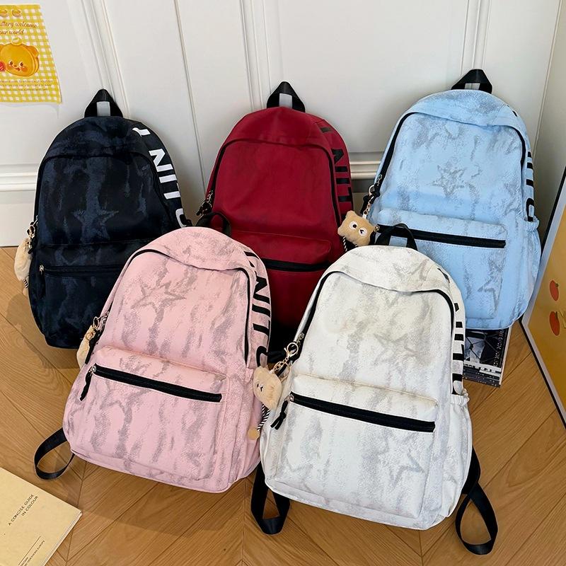 Schoolbag1011 new large-capacity backpack schoolbag, male and female junior high school students backpack, casual simple and lightweight college