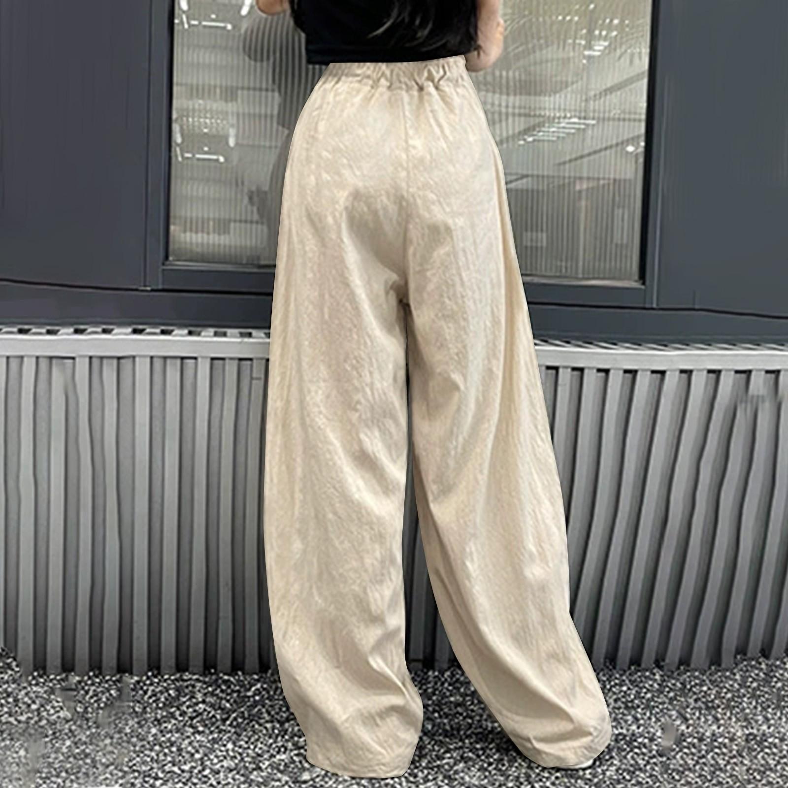 Женские свободные однотонные широкие повседневные брюки из ледяного шелка с морщинами XL — фото 4