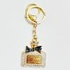 Radiant Bow Perfume Bottle Keychain & Elegant Bag Pendant Gift