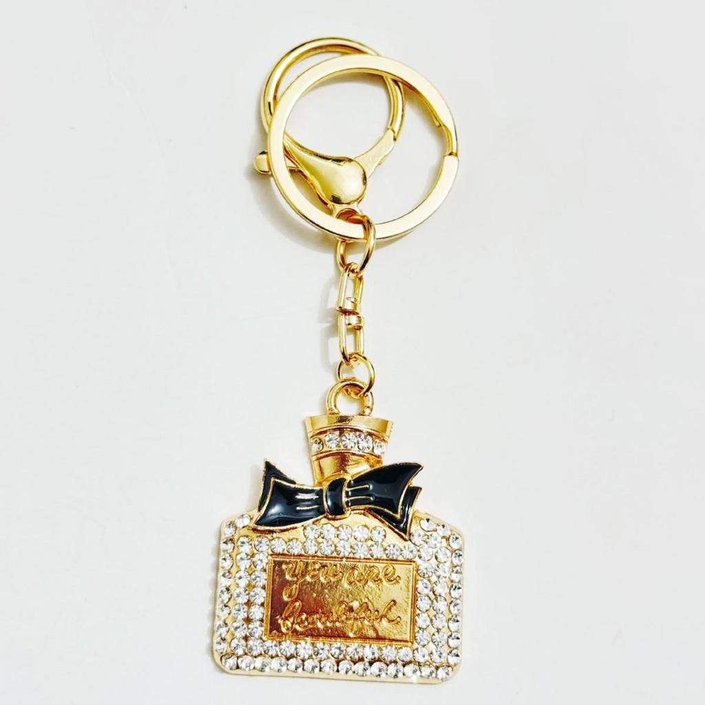Radiant Bow Perfume Bottle Keychain & Elegant Bag Pendant Gift