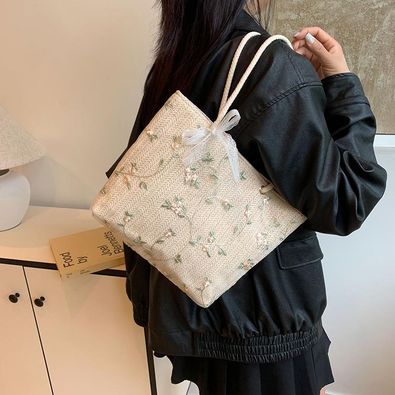 Woven bag new summer niche design bucket bag small fresh simple lace woven bag