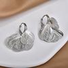 Light luxury super fairy hollow metal petal fringed ear buckle fashionable design high-end temperament elegant earrings