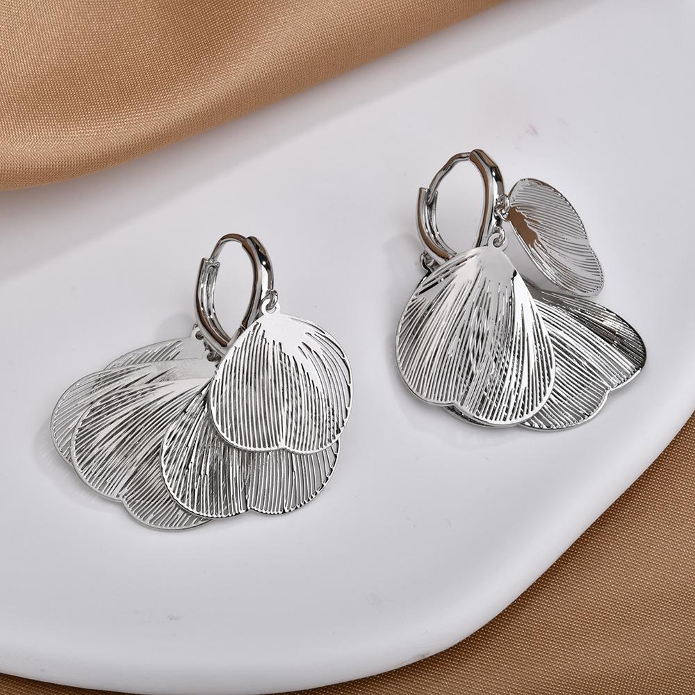 Light luxury super fairy hollow metal petal fringed ear buckle fashionable design high-end temperament elegant earrings