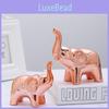 Elegant Ceramic Elephant Figurine As A Decorative Accent For Home And Office Spaces
