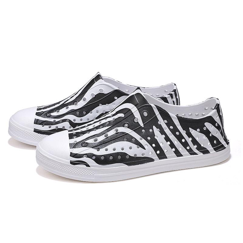 

Foreign trade Europe, America and Vietnam comfortable and breathable sports soft sole eva hollow ink splashing graffiti hole shoes cool rain shoes for 45 зебра