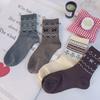 Women's Retro Fair Isle Mid-Calf Slouch Socks: Warm Ethnic Style for Autumn & Winter