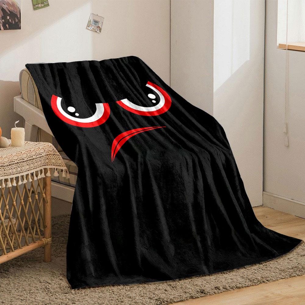 Red and white angry eyes with an arched red frown on a black background. for all seasons blanket lunch break throw gift