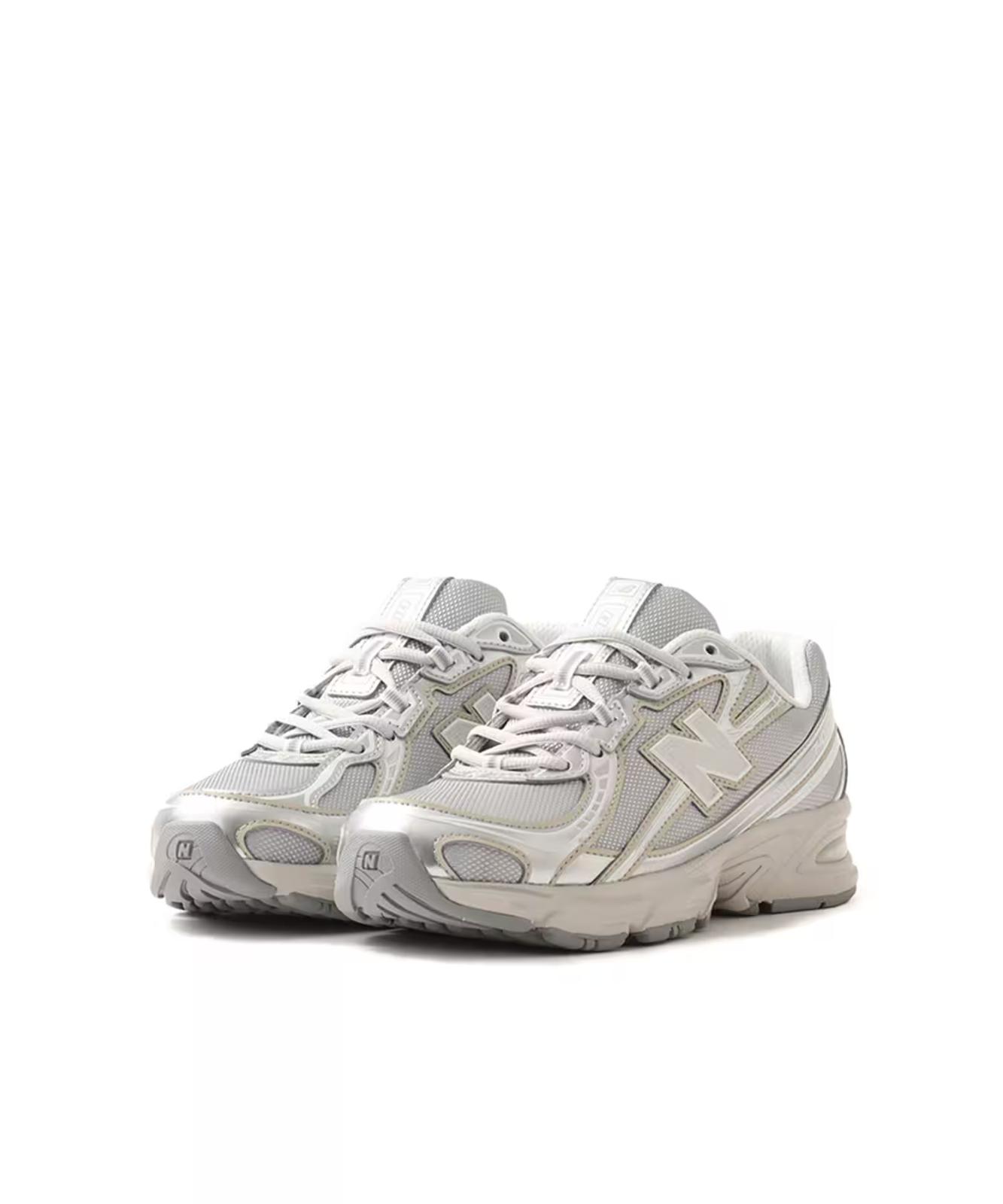 U7405I7 New Balance 740 Metallic Silver (Men s) 10
