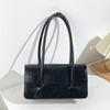 Nischväskor damväskor nya trendiga mode axel armhåleväskor high-end bärbara baguetteväskor