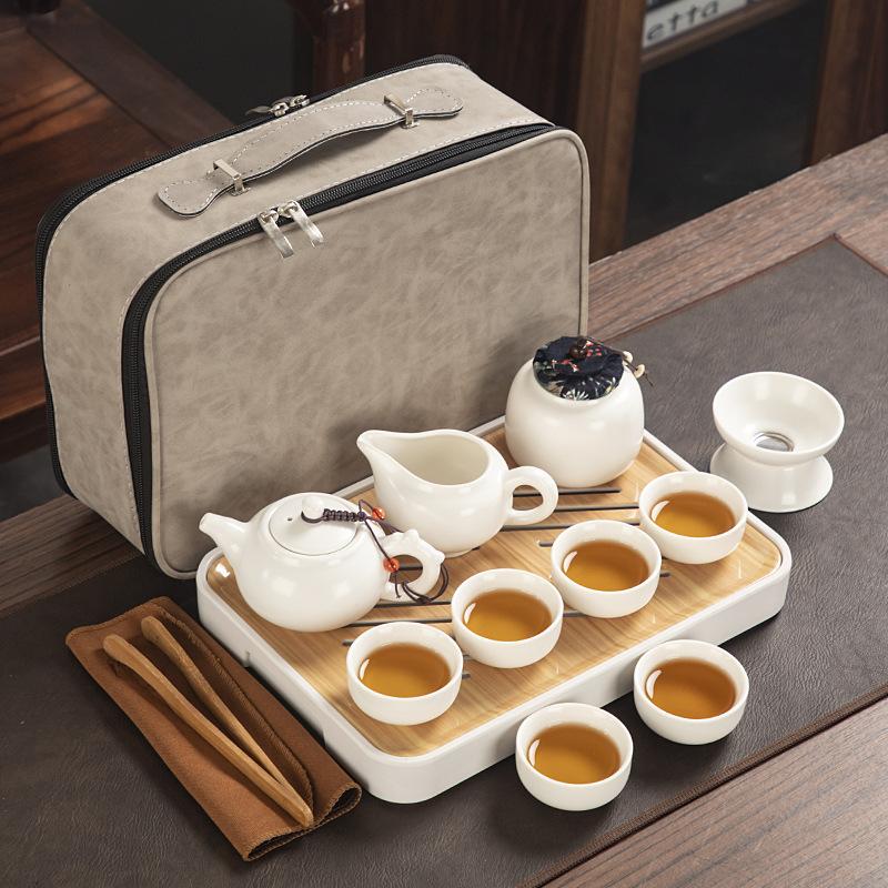 Travel ceramic Kung Fu tea set, tea tray, a full set of portable storage bags, practical business gifts for customers