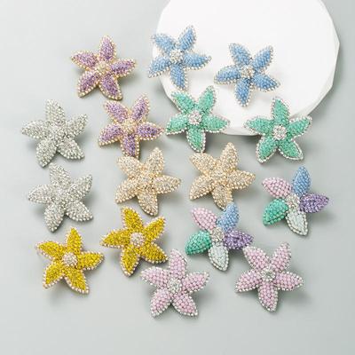 Orecchini a bottone da donna creativi a forma di stella marina in lega con colore elettroplaccato e strass, personalizzati e versatili