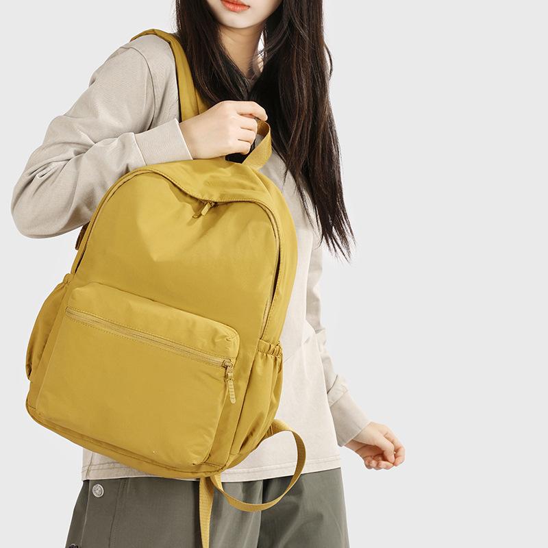 Schoolbag men's and women's casual multi-purpose lightweight large-capacity versatile backpack nylon cloth student class schoolbag commute travel