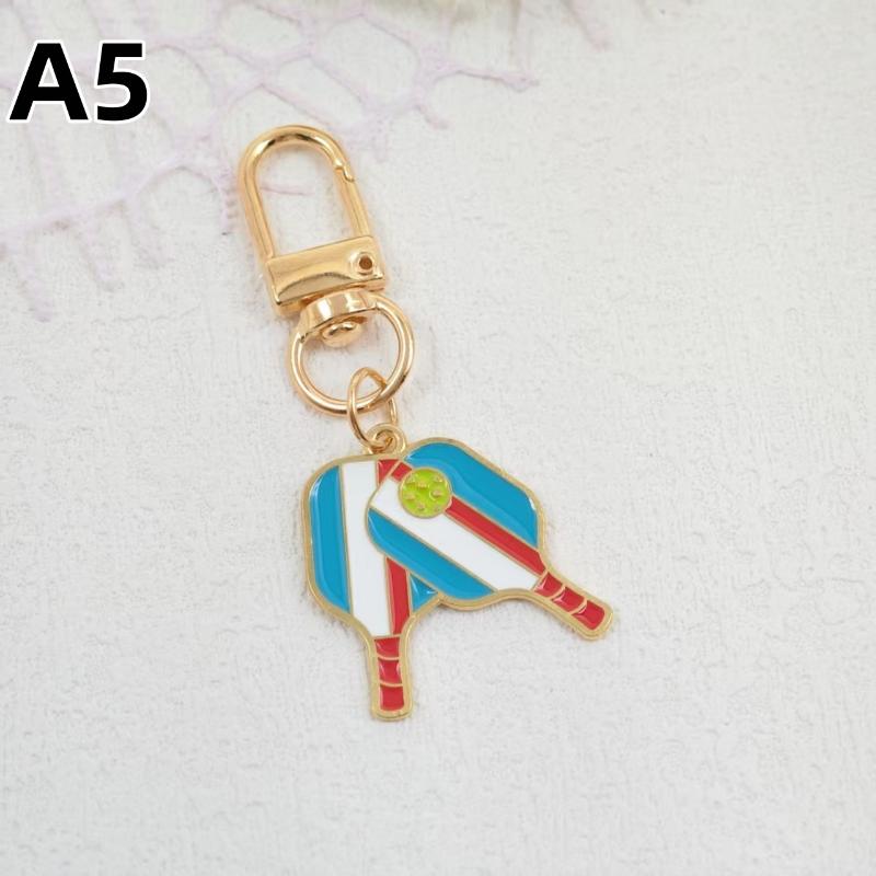 1/5Pcs Creative Pickleball Racket Metal Keychain Colorful Hollow Golf Ball Keychains Dink Ball Fans Party Gift Bag Pendant