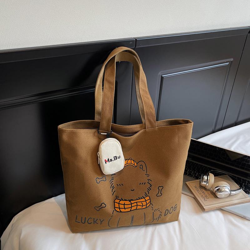 

Повседневная холщовая сумка большой вместимости женская 2025 новая легкая нишевая сумка-мессенджер для поездок на работу с граффити, портативная сумка-тоут no pendant коричневый