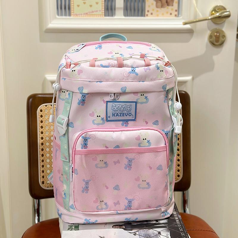 

Student schoolbag new lightweight large-capacity printed backpack junior high school high school high school high value backpack рожевий