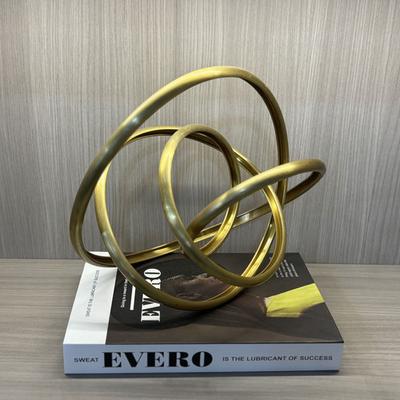 Arte em Metal Abstrata Nó de Corda Ferida Ornaments Artesanato em Metal Anel Dourado Vazado Estatueta de Metal Acessórios de Decoração para Casa