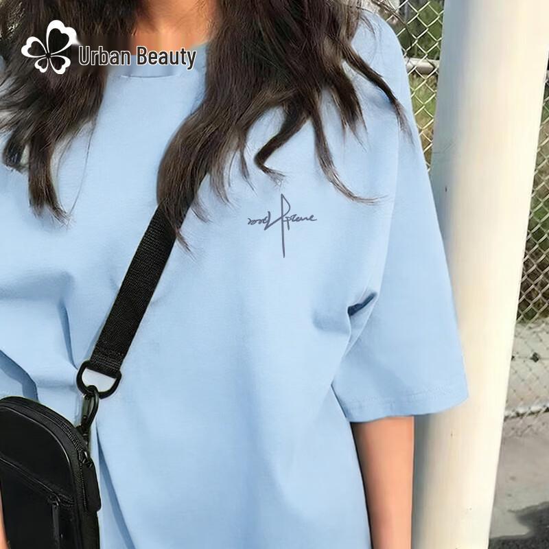 Tricou de damă din bumbac pur, cu croială largă, mânecă scurtă și grafică cu vârf de pix