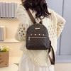 Schoolbag fashion PU travel small backpack storage Korean version lady temperament rivet small backpack trend small backpack