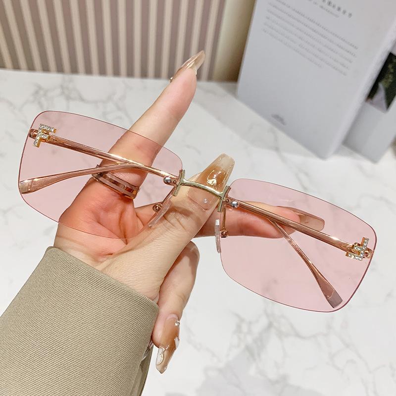 Ruiao rimless sunglasses UV400 fashion square metal glasses for women luxury brand designer diamond y2k small face sun glasses