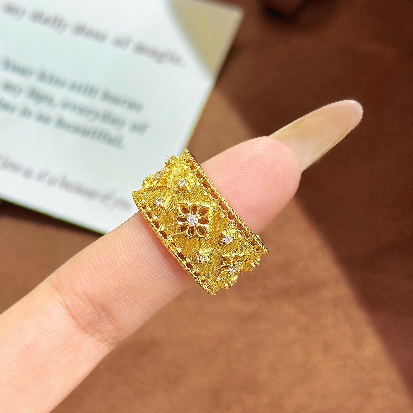 

European and American style brushed hollow ring lace inlaid zircon four-leaf clover hollow court style