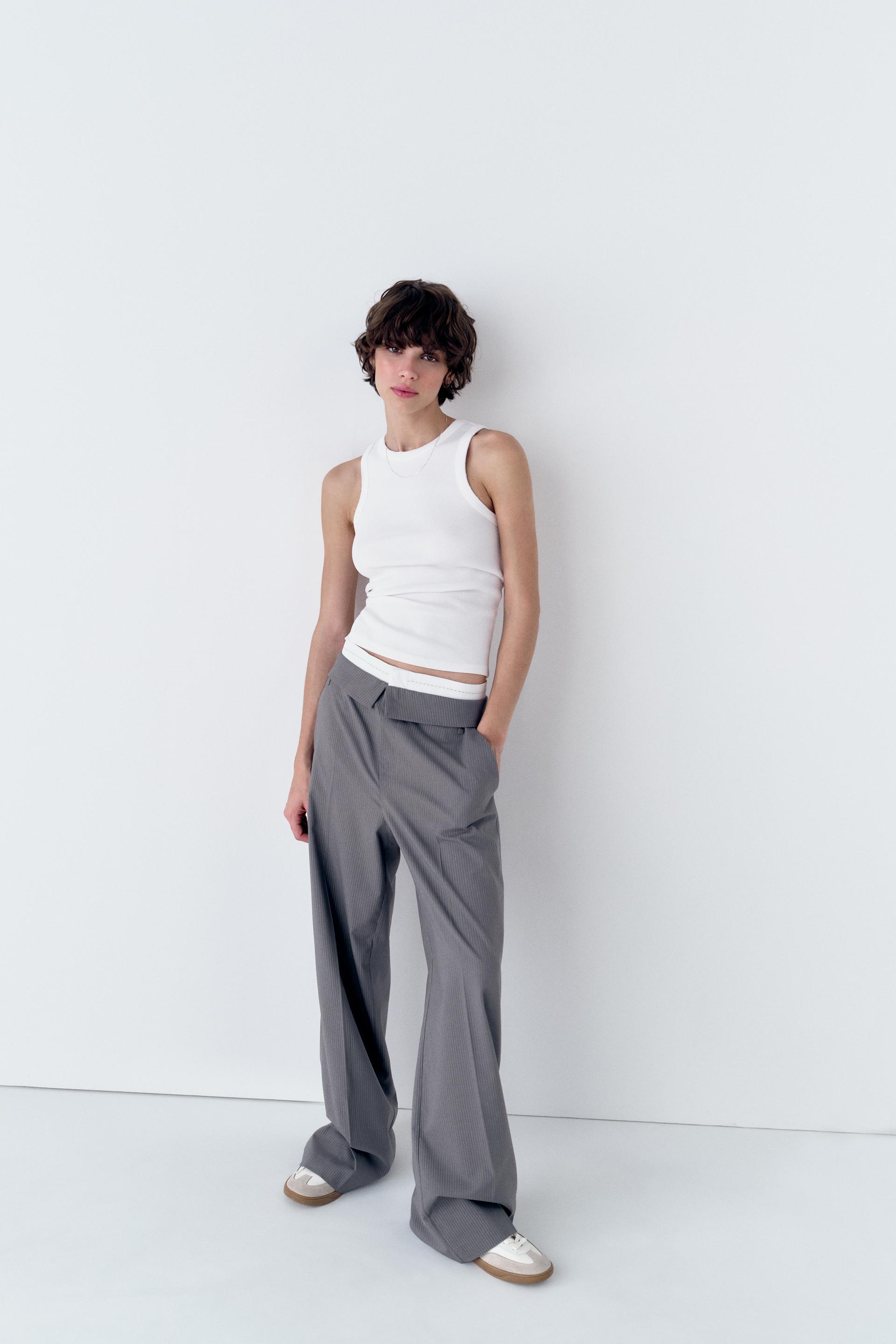 

ТОП БЕЗ РУКАВОВ С ОРУШАМИ