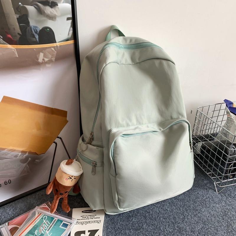 New simple schoolbag women's large-capacity anti-splashing middle school student backpack high-value girl backpack