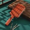 Tan Mujiang Lotus Wood Air Cushion Comb