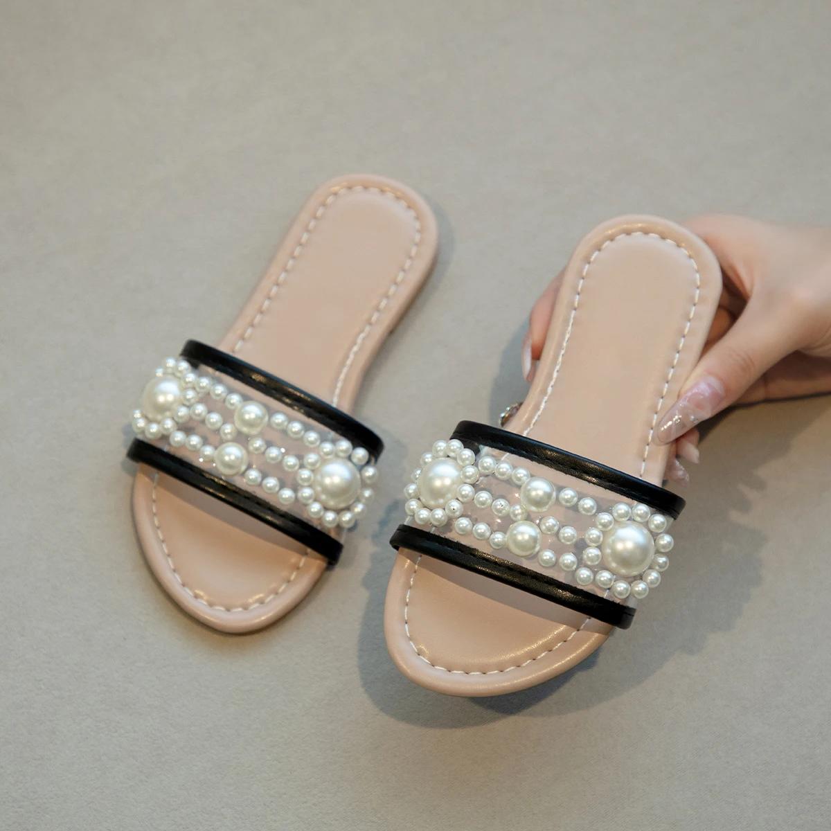 

Детские летние сандалии для отпуска для девочек, жемчужные туфли принцессы, прозрачный цвет, 2024, новые детские тапочки для улицы с острым носком, шикарные 27 чёрный