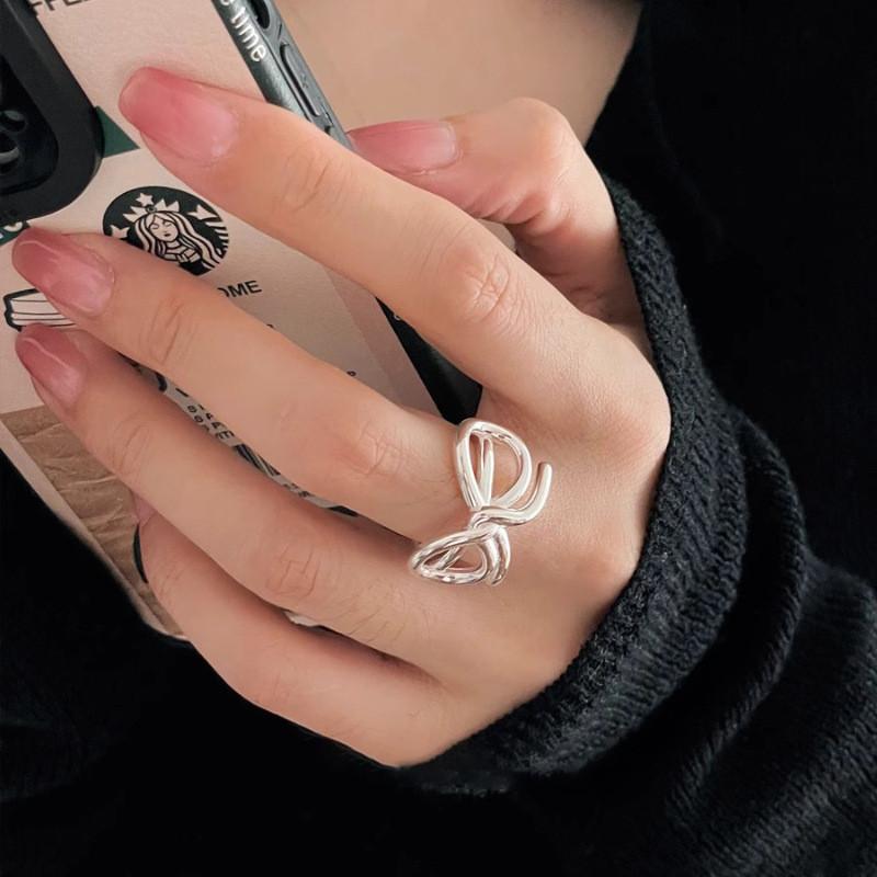 Elegant Open Adjustable Copper Bowknot Ring For Women With Unique Geometric Design