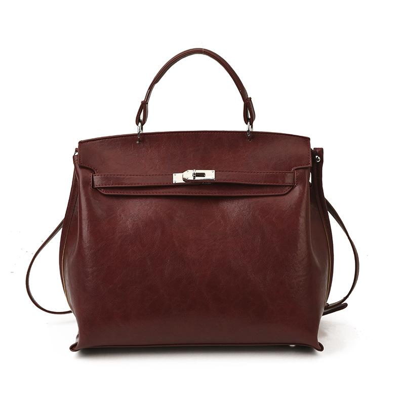 

European and American retro portable briefcase soft leather commuter shoulder Kelly bag large capacity messenger tote bag women бордовый