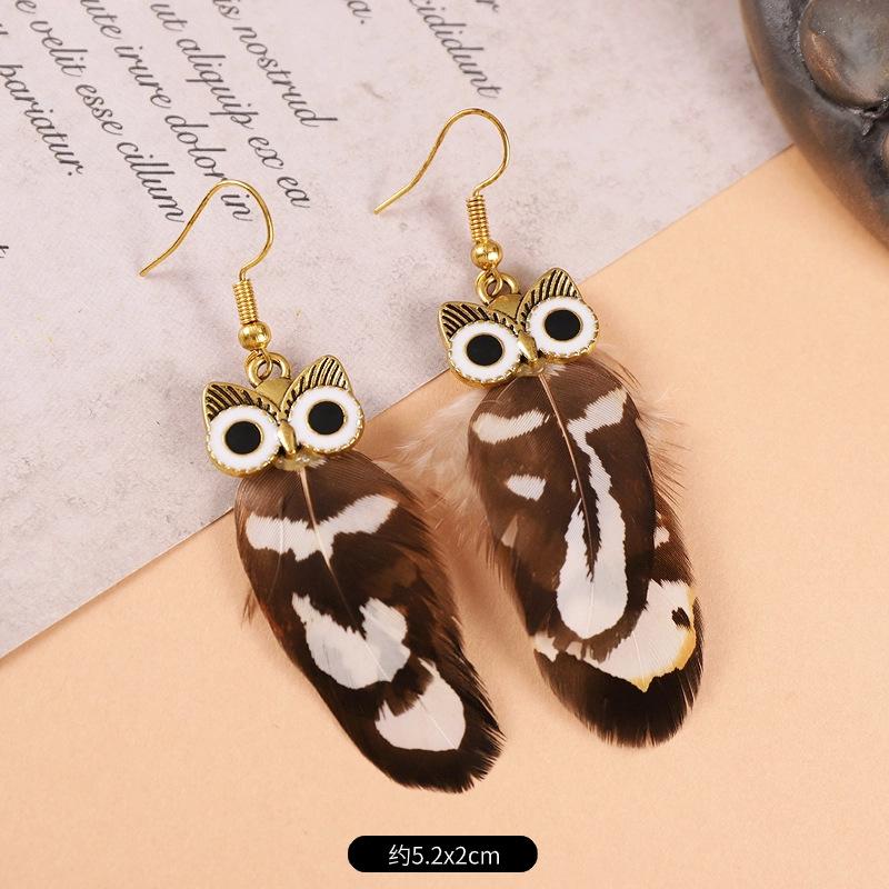 

Ретро серьги с совиными перьями, нишевый дизайн, креативные серьги, темпераментные серьги с павлином для женщин